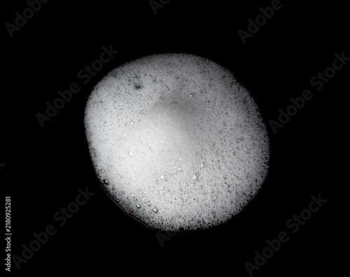 Soap foam on black background