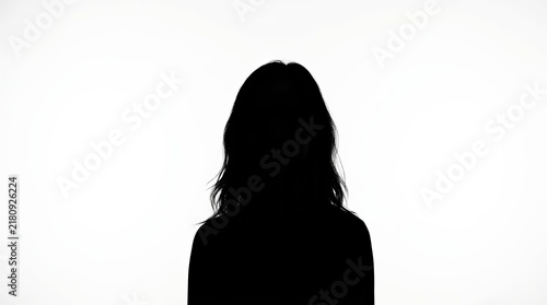 Anonymous female profile depicted as a dark figure in a black silhouette portrait.