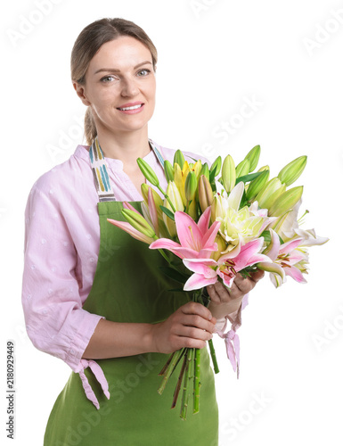 Florist with bouquet of beautiful lilies on white background