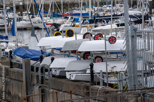 Bild auf Leinwand Small Sailboats Stored at Marina
