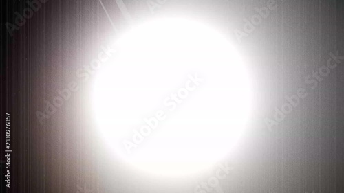 Abstract Background Featuring A Bright Glowing White Circle With Subtle Retro Film Texture Overlay Effect