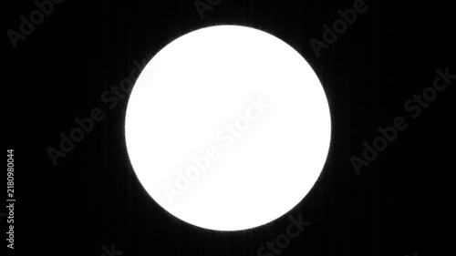 Minimalist graphic element featuring a glowing white circle isolated against a deep solid black background