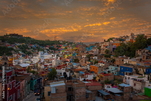 Bild auf Leinwand sunset in the city with university lit up and a beautiful sky in Mexico
