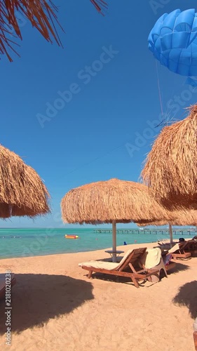 Tropical parasailing adventure over clear blue ocean waters.Egypt. Hurghada.