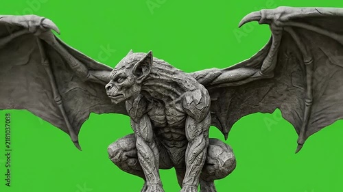 Halloween gargoyle creature with bat wings on green screen