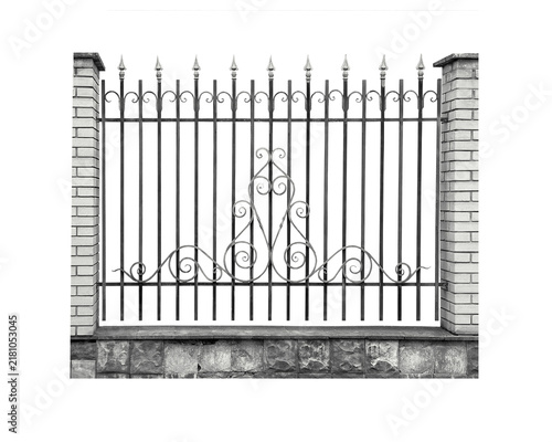 Fotografie Decorative wrought iron fence with elegant scrollwork and ornate spearhead finials, framed by stone clad columns