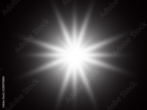 Fotografie Bright starburst light effect with sharp rays emanating from a central glow agai