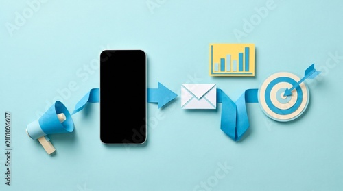 Conceptual digital marketing and swift communication workflow with smartphone, megaphone, email, and data chart leading to a business target on blue background.