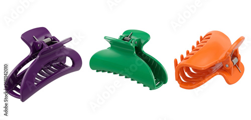 Plastic hair claw clips in assorted bright colors on transparent background