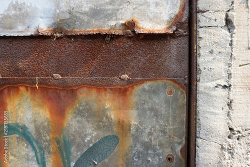Fotografie Rust covers metal surfaces in vivid orange tones