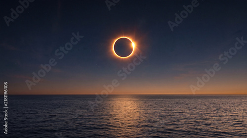 Ring of Fire Solar Eclipse Over Ocean Horizon