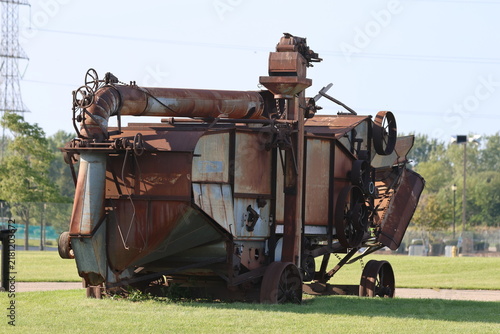 Konstfotografi Full Side View of Rusted Antique Grain Threshing Machine
Category: Industry