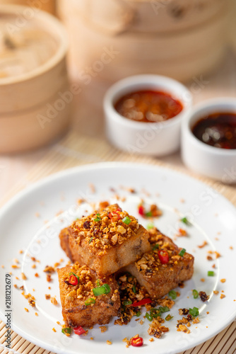 Obraz na płótnie Fried Chinese Turnip Cake Served with Dipping Sauce