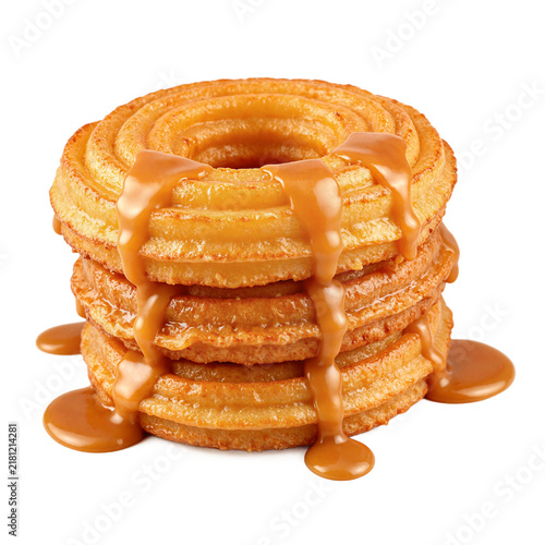 Churros cajeta caramel Mexican fried dough spirals with thick dulce de leche drizzle isolated on a transparent background