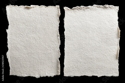 Textured blank sheets of paper on a black background perfect for creative design projects and mockup presentations