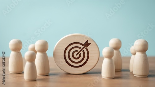 Target Goal Concept with Wooden Figures Representing People and Strategic Focus