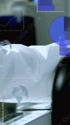 Animation of globes, computer language, caucasian scientist removing liquid beakers from equipment