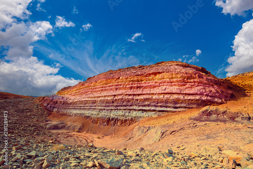 Mountain desert landscape. Colorful sandstone mount in  National Park Makhtesh Ramon Crater in Negev desert, Israel