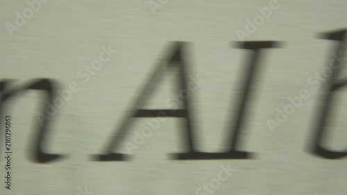 Scanning Printed Newspaper Headlines to Find Words Related to AI, an Artificial Intelligence