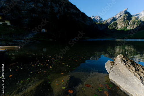 Obraz na plátně Serene view of Seealpsee lake reflecting the majestic peaks of the Alpstein mass
