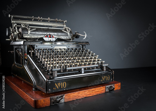 Konstfotografi Vintage typewriter machine on a dark low key background