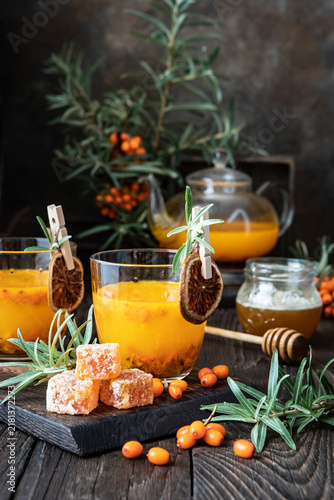 Sea buckthorn hot tea, autumn drinks concept