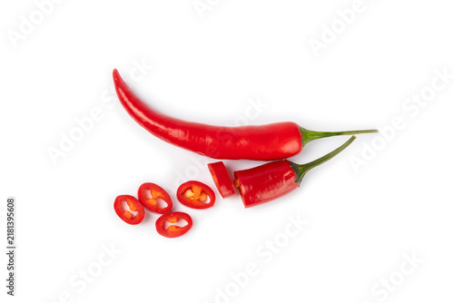 Red chili pepper isolated on white background. Fresh slice of hot pepper. Vegan, vegetable. Pepper cut into slices on a white background close-up.