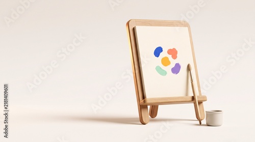 Small wooden easel with abstract colorful shapes on canvas