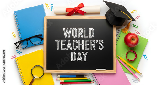 School supplies and a chalkboard with world teachers day message on a white background