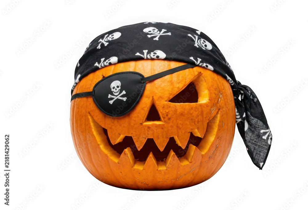 Fototapeta premium Carved pumpkin wearing a pirate bandana and eye patch isolated on transparent background