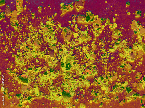 Fotografie Highly detailed abstract grunge texture featuring bright yellow, lime green and ochre fragments scattered across a deep burgundy background