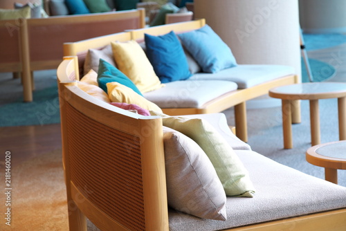 Fototapeta Modern lounge sofa with colorful pillows in a contemporary interior