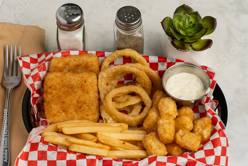 Принти на полотні haddock fillets with onion  rings and tater tots