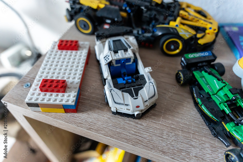 Obraz premium Warsaw, Poland - Sep 4, 2026: LEGO Technic construction toys and building blocks arranged on a wooden shelf
