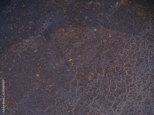 Aerial view of an agricultural liquid manure storage tank with a textured surface in Virpe, Ventspils novads, Latvia.