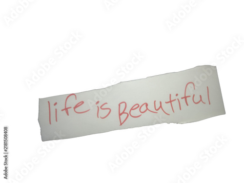 Foto Handwritten note with the inspirational message life is beautiful in red ink iso