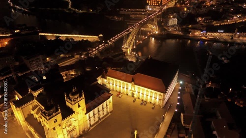 Aerial Reveal from Porto Cathedral to Dom Luis I Bridge at Night