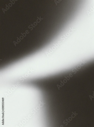Abstract grainy black and white background with diagonal gradient light streak, retro film noise texture and dramatic monochrome aesthetic