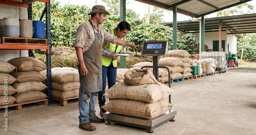 Coffee Farmer Weighing Green Coffee Beans for Customer
