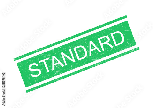 Green standard stamp with white text saying standard