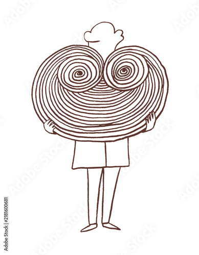 Man chef is holding a large cinnabon