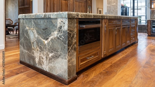Elegant kitchen island with marble countertop and wooden cabinetry design