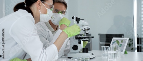 Fotografie Two scientists collaborating in a modern laboratory