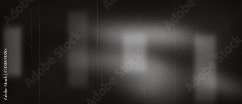 Vintage film texture with light leaks and grain on a black background with grunge