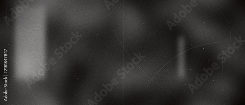 Vintage dark film texture with scratches and grain particles on black background