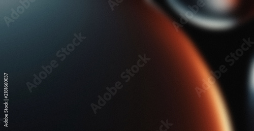 Abstract dark background with soft red and orange light glow