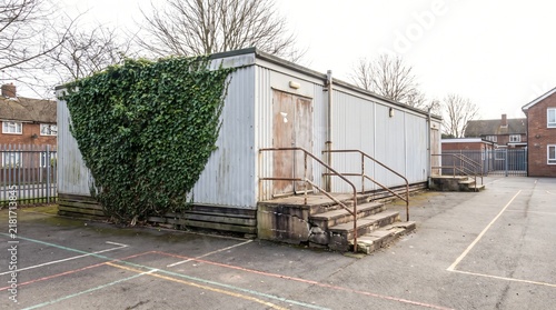 Ageing Portable Classroom Cabin In A School Yard Showing A Permanent Temporary Fix