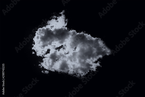 Single fluffy white cloud isolated on a dark black background