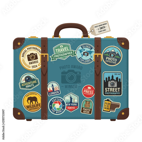 Vintage travel suitcase with photography adventure stickers flat illustration