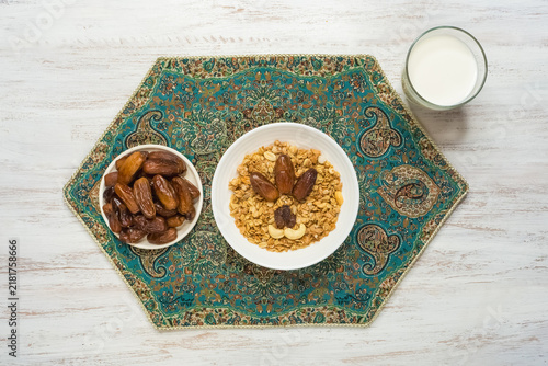 Healthy Ramadan fitness breakfast with high energy granola dates and milk